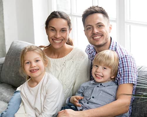 Happy Multi Ethnic Family Bonding Together in Their New Home in Boston